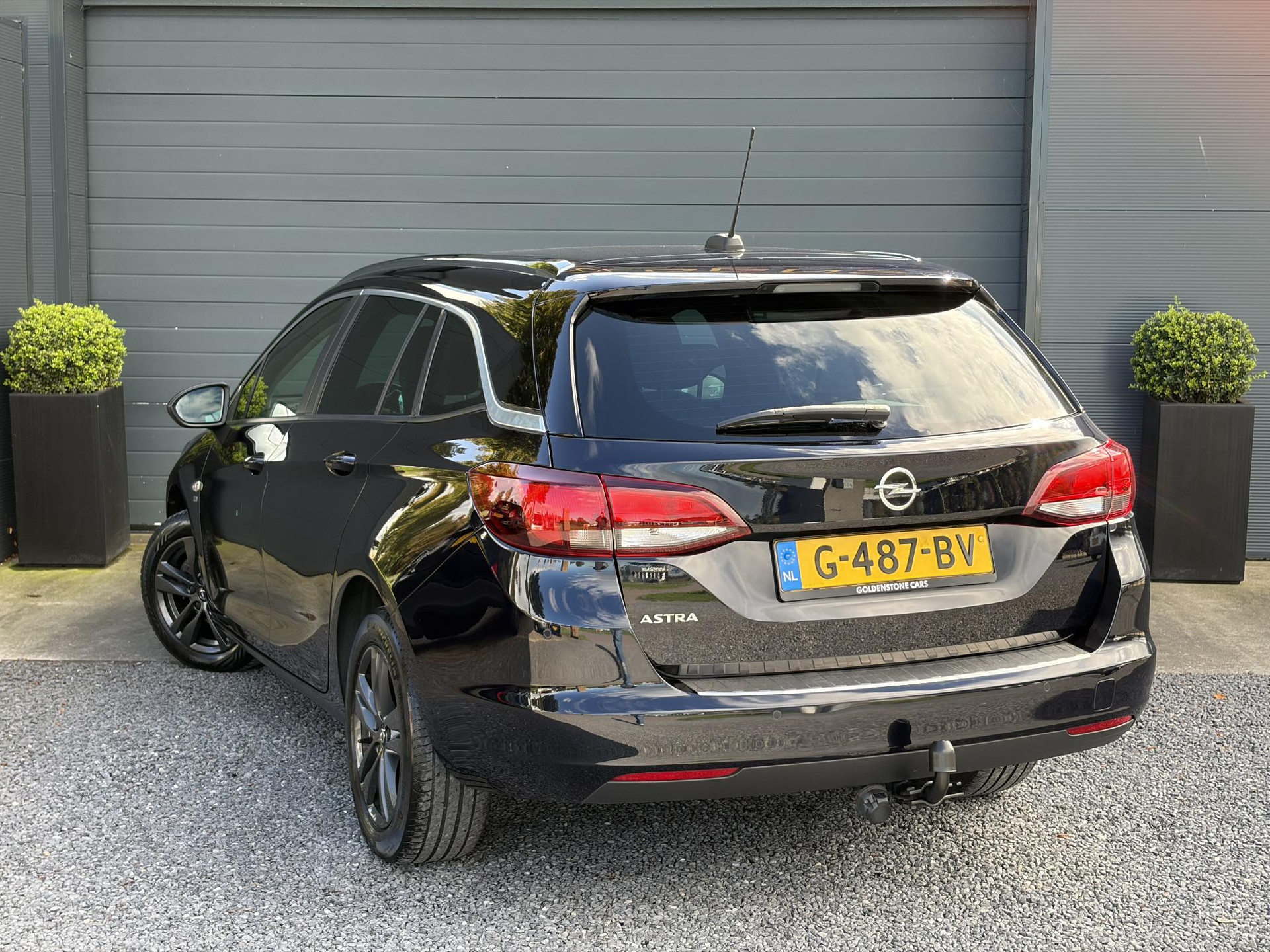 Opel Astra Sports Tourer 1.4 Turbo 120 Jaar Edition ✓150pk✓Carplay✓Navi✓Trekhaak✓Pdc V+A✓Clima✓Cruise✓6 Bak✓Lm velgen✓N.A.P✓Apk tot 02-2028