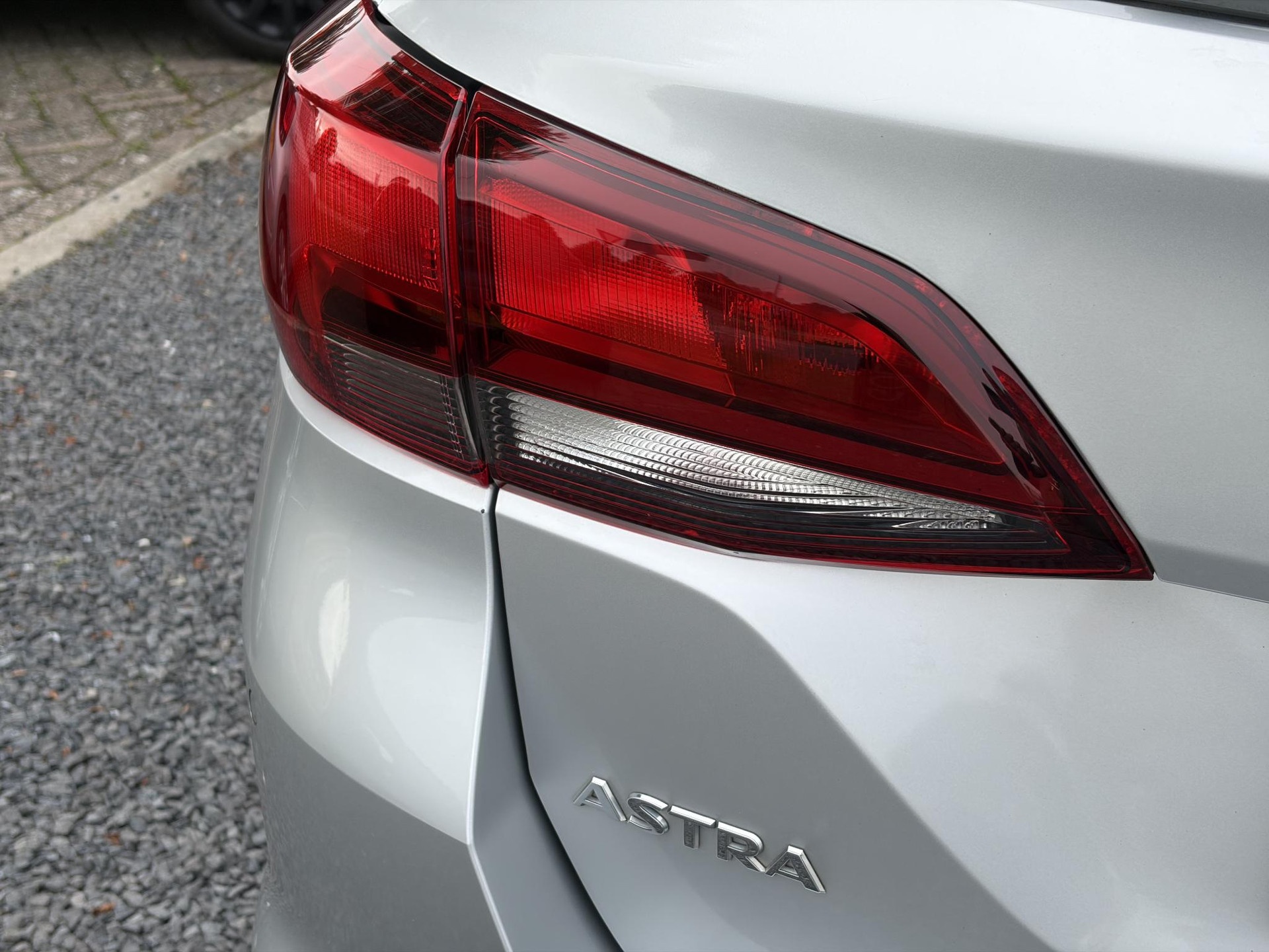 Opel Astra Sports Tourer 1.0 Online Edition ✓2e Eigenaar✓Carplay✓Navi✓Trekhaak✓Net beurt gehad✓Clima✓Cruise✓Pdc V+A✓105pk✓N.A.P✓Lm velgen✓Apk tot 10-2027