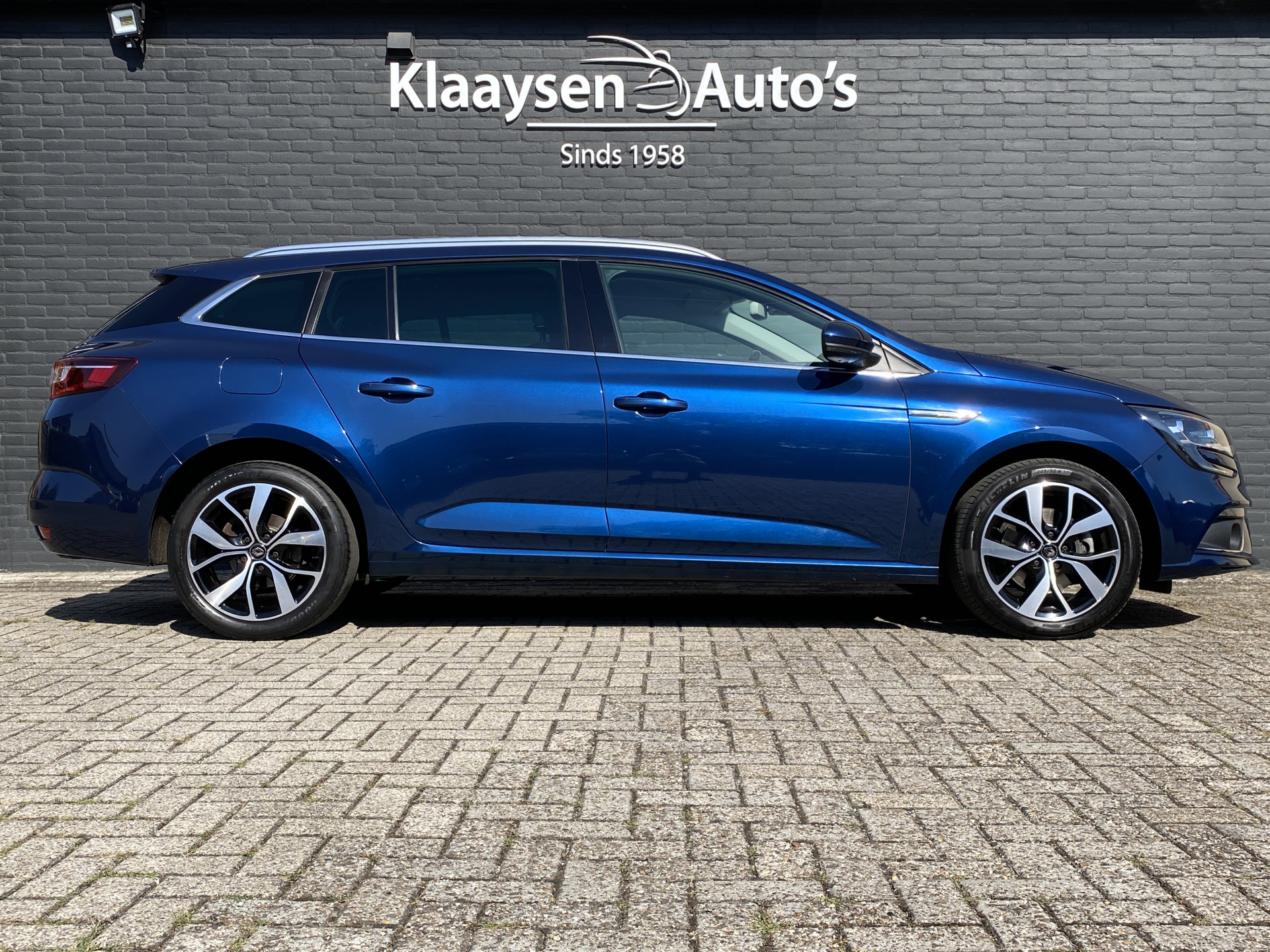 Renault Mégane Estate 1.3 TCe Bose 160 pk AUT. | navigatie | cruise control | trekhaak | bose audio | keyless | privacy glas
