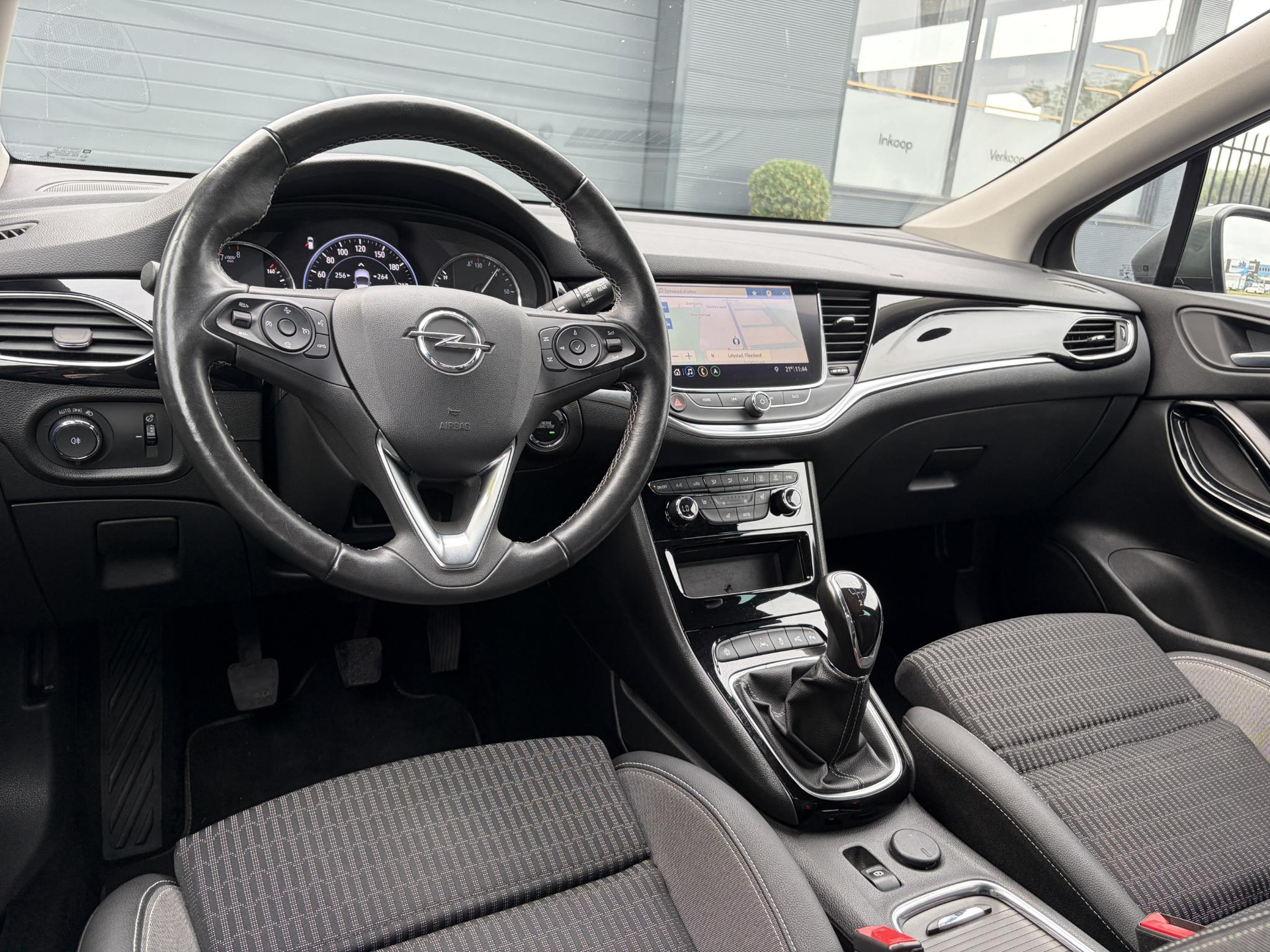 Opel Astra Sports Tourer 1.2 Elegance ✓131pk✓2e Eigenaar✓Camera✓Carplay✓6 Bak✓Stoelverw✓Stuurverw✓Pdc V+A✓Recent beurt gehad✓Clima✓Cruise✓Halfleder✓Keyless✓N.A.P✓Lm velgen✓Rijstrooksensor✓Apk tot 09-2028