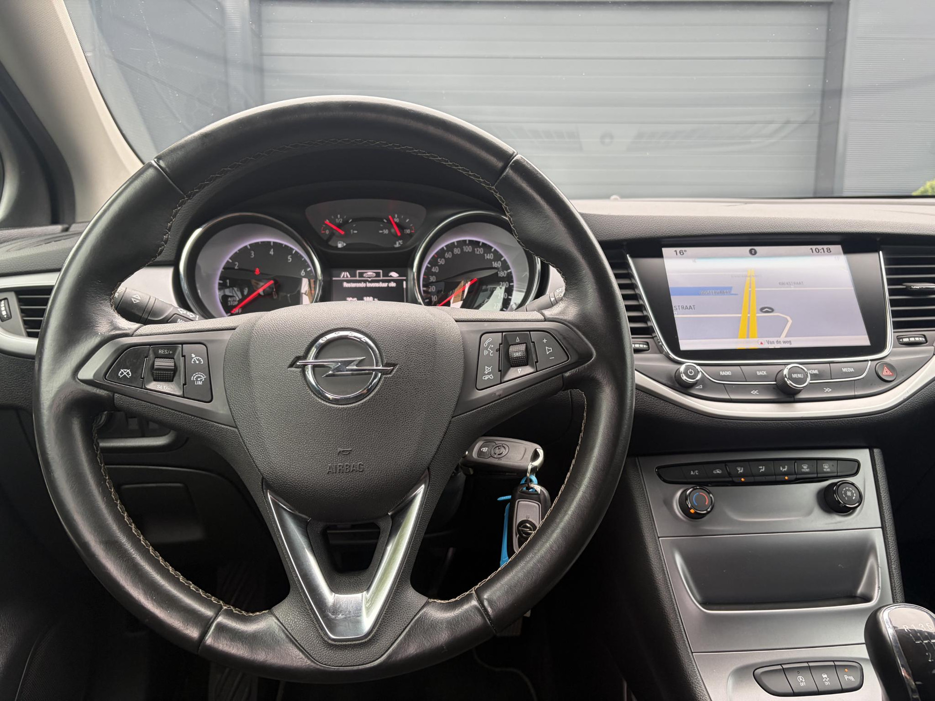 Opel Astra Sports Tourer 1.0 Online Edition ✓2e Eigenaar✓Carplay✓Navi✓Trekhaak✓Net beurt gehad✓Clima✓Cruise✓Pdc V+A✓105pk✓N.A.P✓Lm velgen✓Apk tot 10-2027