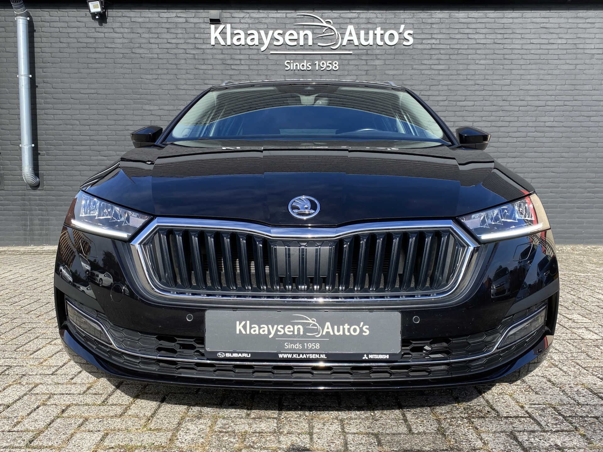 ŠKODA Octavia Combi 1.0 e-TSI Business Edition Plus AUT. | 1e eigenaar | dealer onderh. | navigatie | trekhaak | carplay | adaptieve cruise