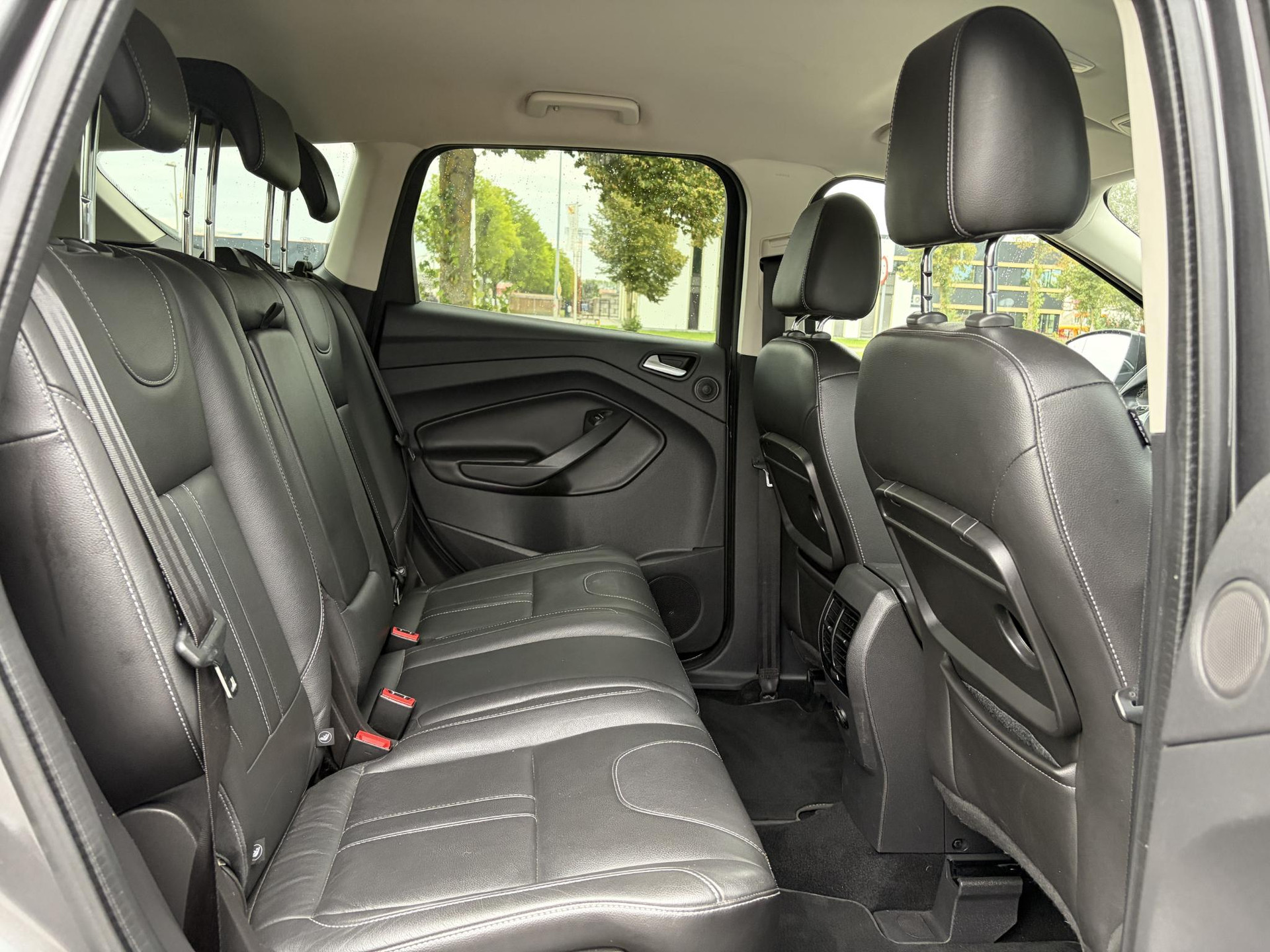 Ford Kuga 1.5 Titanium Plus 4WD ✓2e Eigenaar✓Camera✓183pk✓Trekhaak✓Leder✓Stoelverw✓Navi✓Clima✓Cruise✓Pdc V+A✓Elekt Stoelen✓Dodehoeksensor✓Net beurt gehad✓19''Lm velgen✓N.A.P✓Apk tot 08-2027