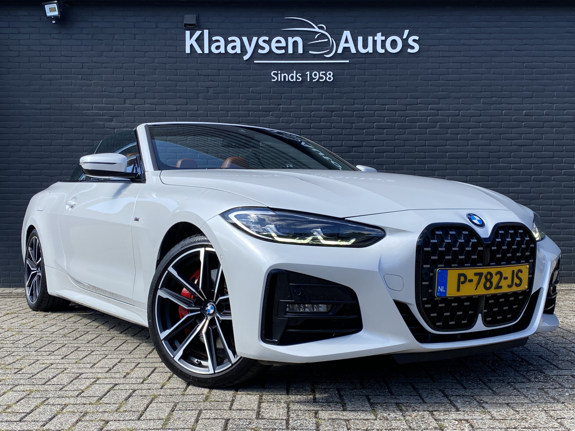 BMW 4-serie Cabrio 420i M-Sport 184 pk High Executive AUT. | dealer onderh. | cognac leder | memory seat | trekhaak | stoel-/stuurverw.