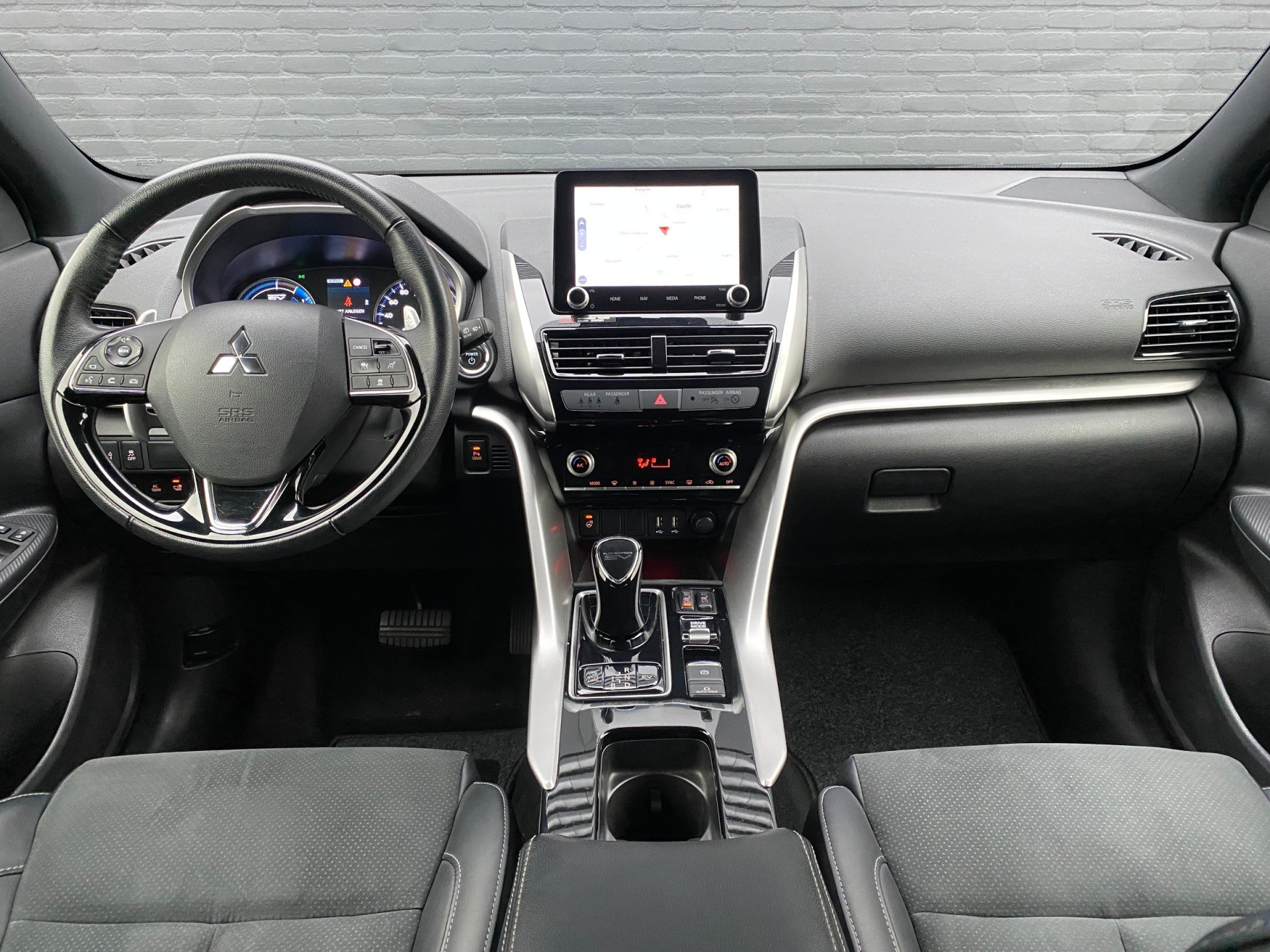 Mitsubishi Eclipse Cross 2.4 PHEV Instyle 4WD 188 pk AUT. | 1e eigenaar | navigatie | stoel-stuurverwarming | leder/alcantara interieur