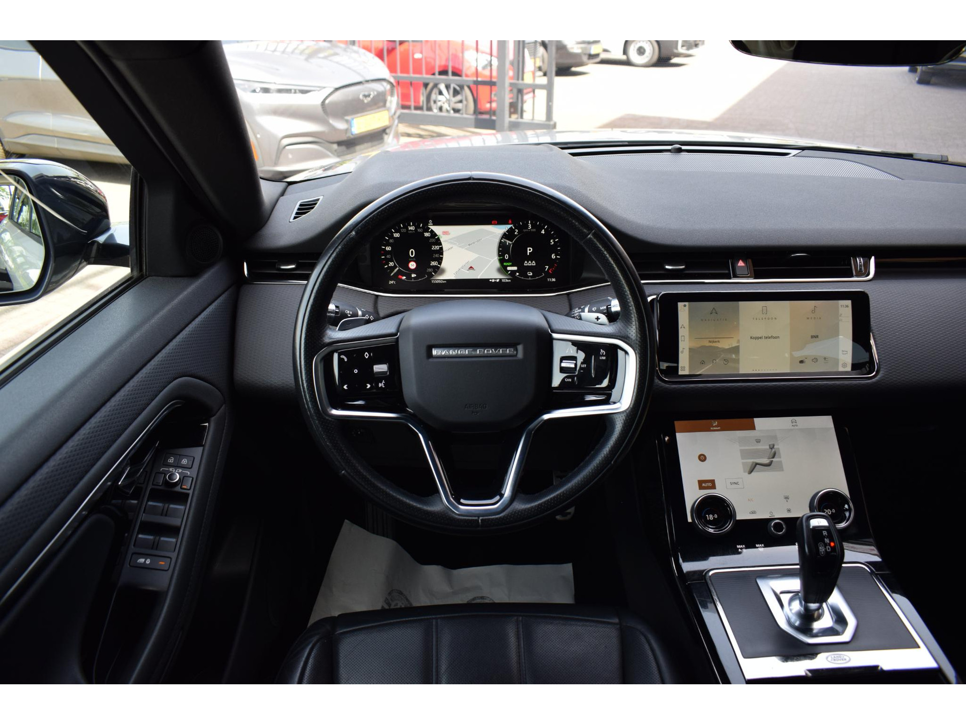 Land Rover Range Rover Evoque 1.5 P300e AWD SE | R-Dynamic | Trekhaak | Leer | Camera