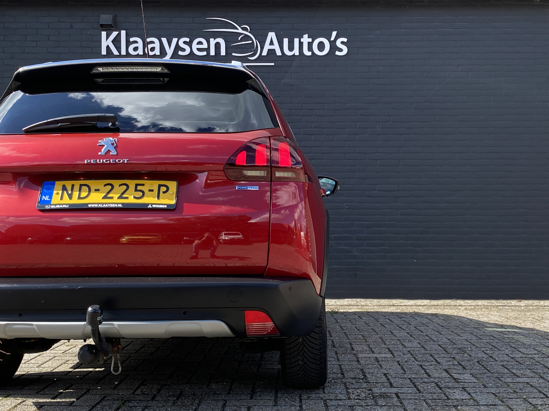 Peugeot 2008 1.2 PureTech Allure AUT. | dealer onderh. | panoramadak | trekhaak | navigatie | cruise control | all season banden