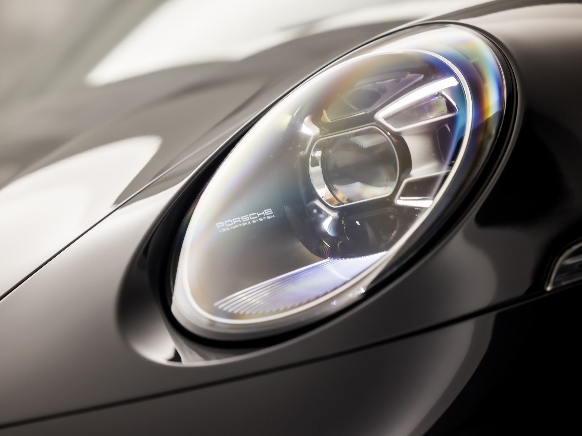 Porsche 911 Cabrio 3.0 Carrera 385Pk (SPORT CHRONO PAKKET, SPORTUITLAAT, BOSE AUDIO, LED MATRIX, APPLE CARPLAY, CAMERA, SFEERVERLICHTING, STOELVERWARMING, NIEUWSTAAT)