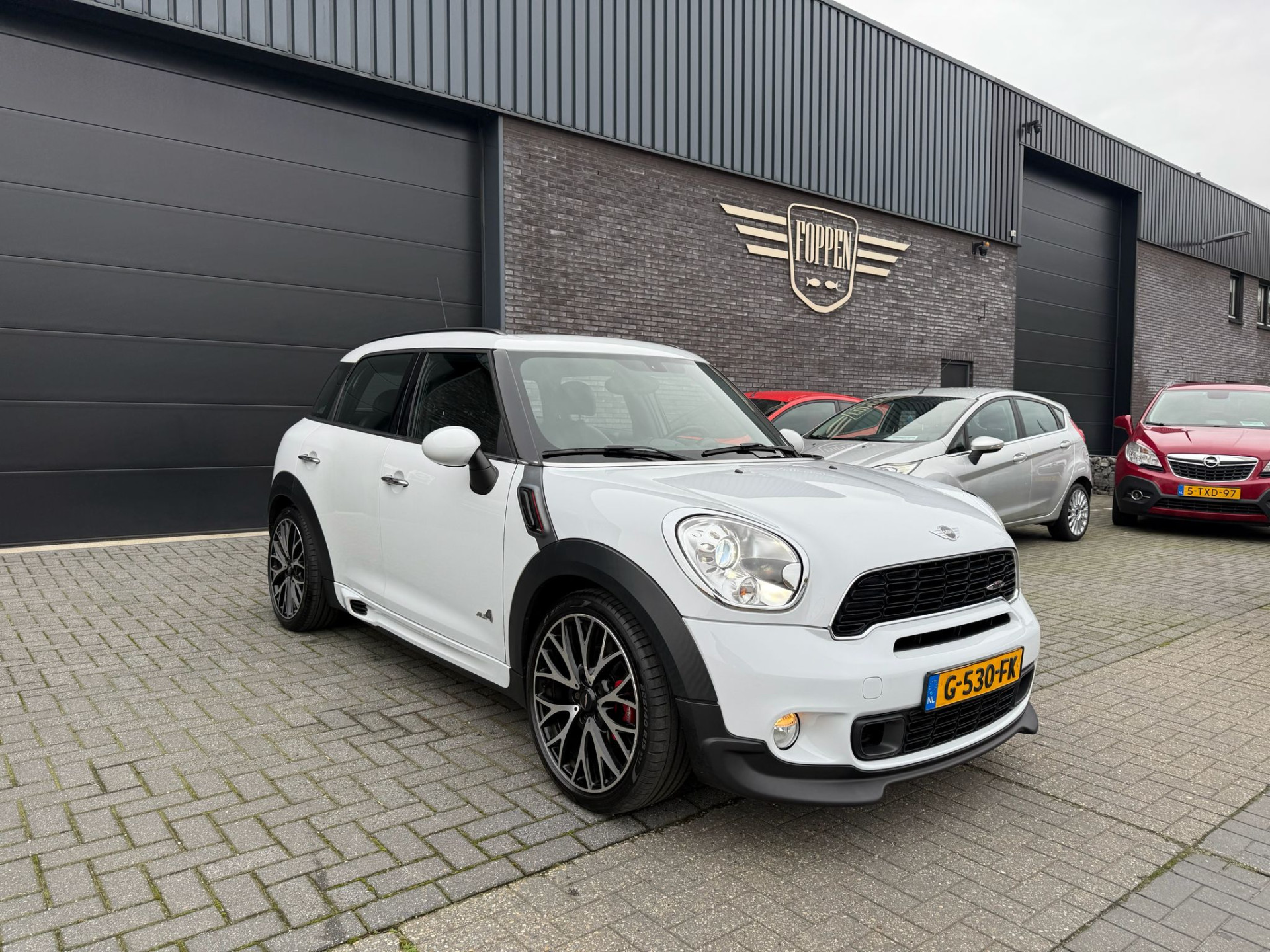 MINI Mini 1.6 John Cooper Works | 1E EIGENAAR | 3/6/12MND GARANTIE | AUTOMAAT | JOHN WORKS | XENON | CRUISE | NAVI |