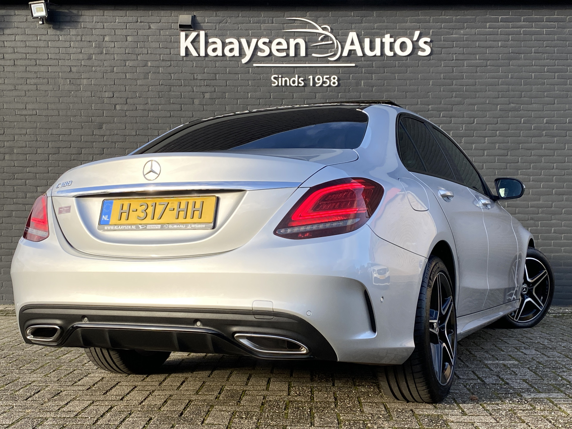 Mercedes-Benz C-klasse 180 Business Solution AMG AUT. | dealer onderhouden | panoramadak | night pakket | navigatie | NL auto