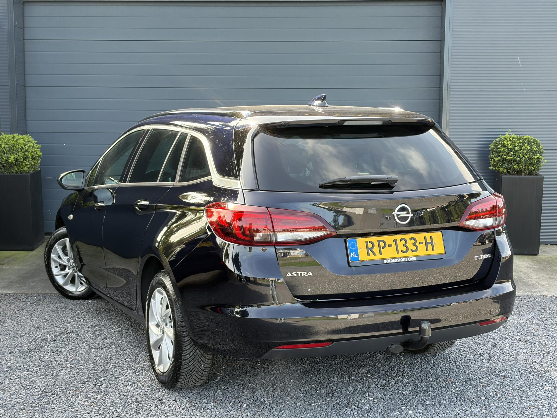 Opel Astra Sports Tourer 1.4 Business Executive ✓2 Eigenaar✓Camera✓Navi✓Trekhaakt✓Carplay✓Stoelverw✓Stuurverw✓Automaat✓Dealer Onderhouden✓Keyless✓Clima✓Cruise✓Pdc V+A✓Halfleder✓Comfortstoelen✓150pk✓Rijstrooksensor✓Dodehoeksensor✓Elekt Stoelen✓Lm velgen✓N.