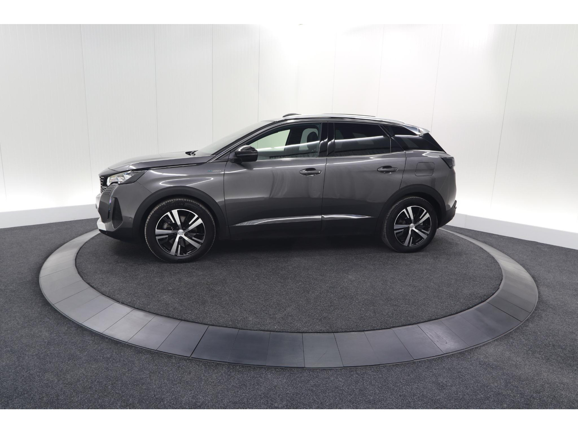 Peugeot 3008 HYbrid4 300 GT | Elektrisch Panoramadak | Dodehoekdetectie | Camera | Navigatie