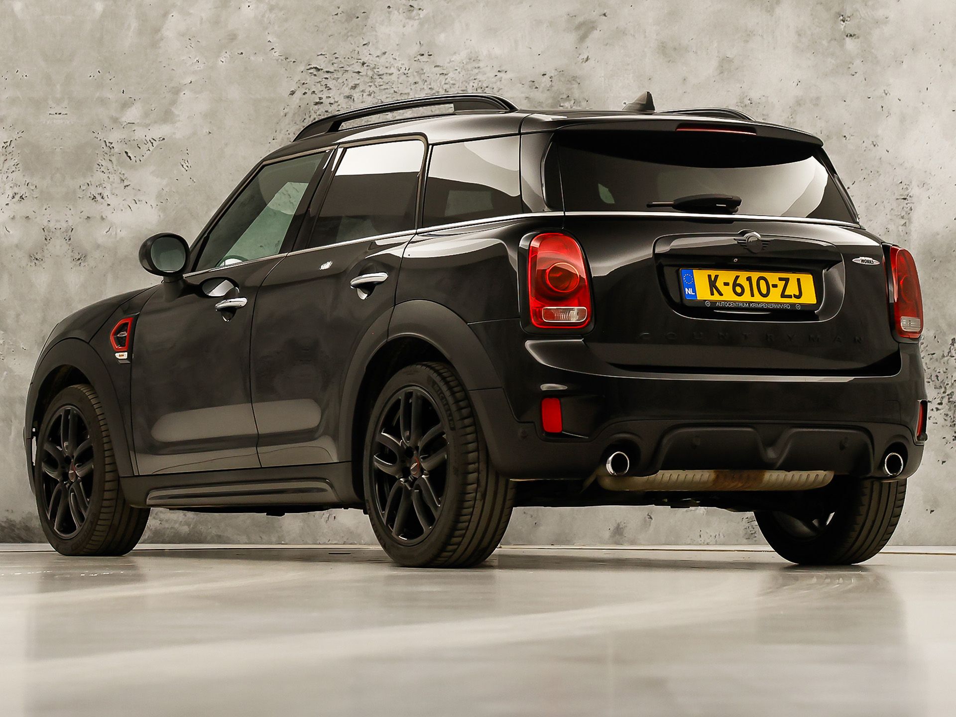 MINI Countryman 2.0 Cooper S John Cooper Works Chili 192Pk Automaat (PANORAMADAK, GROOT NAVI, LEDER, HARMAN/KARDON, CAMERA, STOELVERWARMING, SPORTSTOELEN, GETINT GLAS, NIEUWSTAAT)