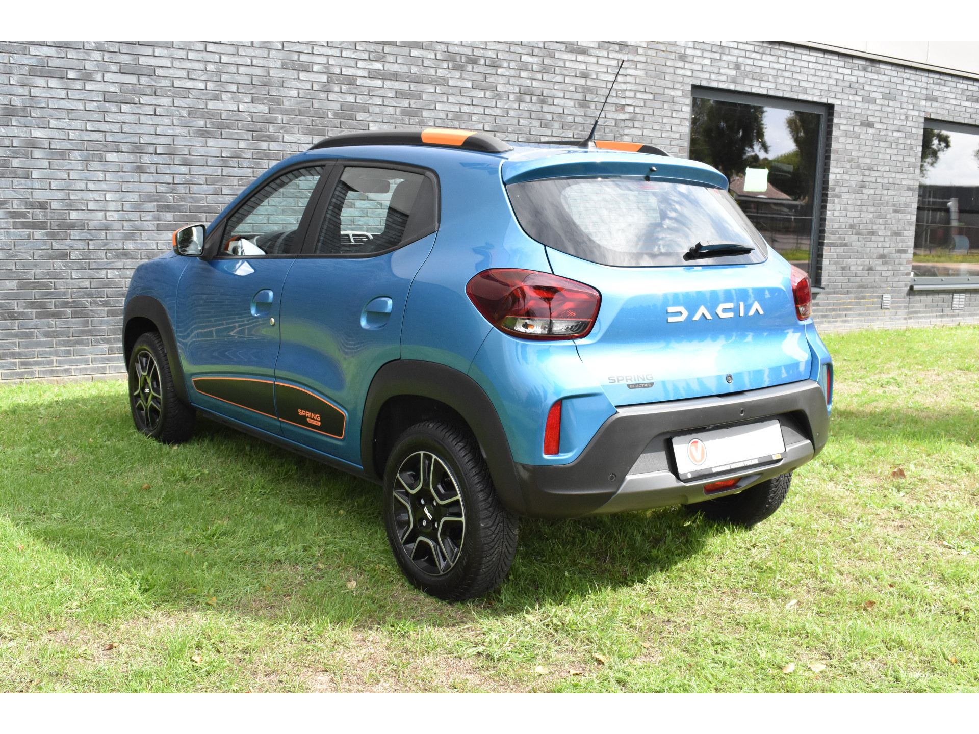Dacia Spring Essential 27 kWh vol electric navigatie pdc Leer