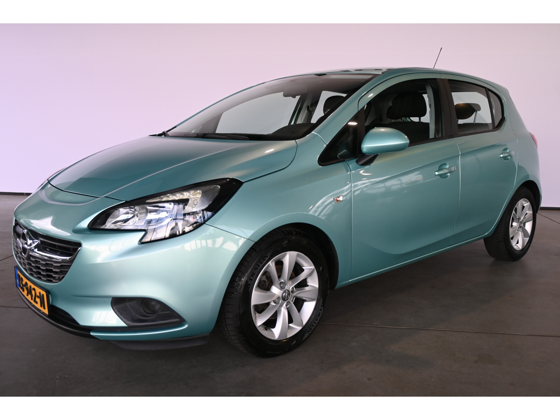 Opel Corsa 1.4 Edition Airco Cruise control Lichtmetaal Elektrisch Pakket Goed Onderhouden! Inruil Mogelijk!