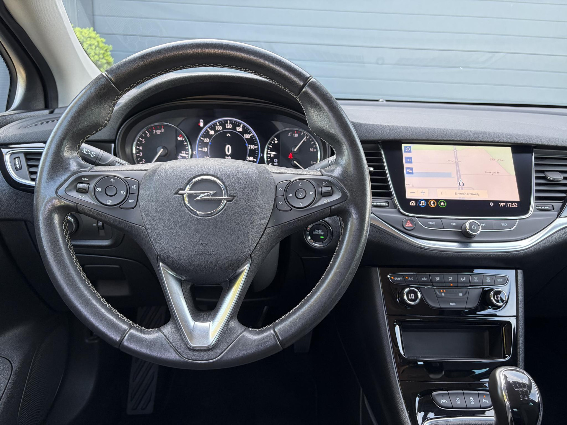Opel Astra Sports Tourer 1.2 Business Elegance ✓1e Eigenaar✓110pk✓Carplay✓Camera✓Navi✓Clima✓Cruise✓Halfleder✓Comfortstoel✓Pdc V+A✓6 Bak✓Dealer Onderhouden✓Keyless✓Lm velgen✓N.A.P✓Apk tot 06-2027