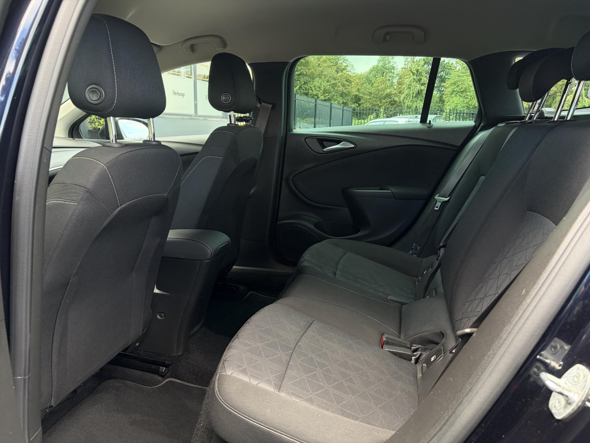 Opel Astra Sports Tourer 1.4 Turbo 120 Jaar Edition ✓150pk✓Carplay✓Navi✓Trekhaak✓Pdc V+A✓Clima✓Cruise✓6 Bak✓Lm velgen✓N.A.P✓Apk tot 02-2028