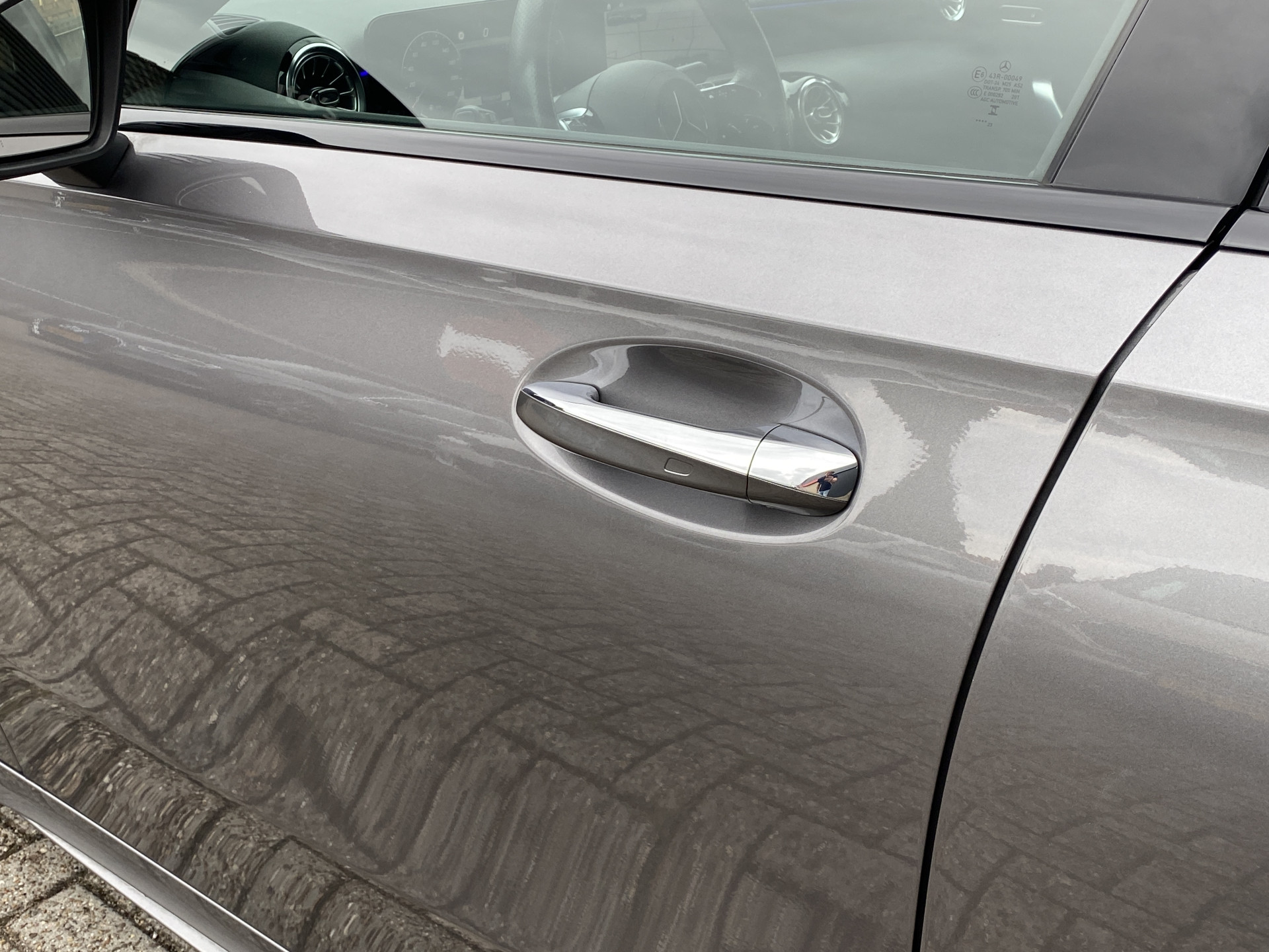 Mercedes-Benz A-klasse 180 AMG Line AUT. | 1e eigenaar | dealer onderh. | panoramadak | camera | night pakket | sfeerverlichting