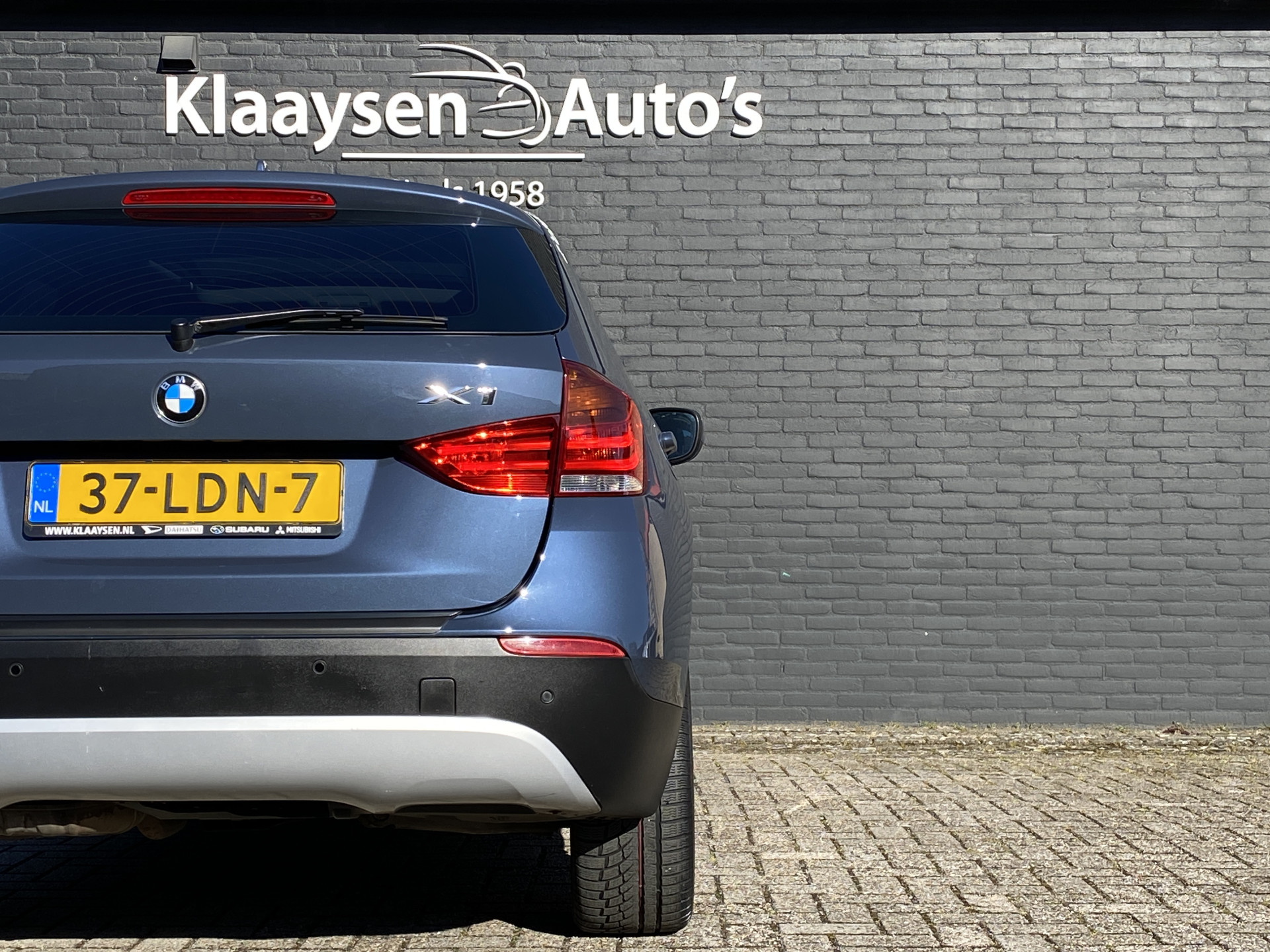 BMW X1 sDrive18i Executive AUT. | navigatie | panoramadak | sportstoelen | xenon verlichting | lichtmetalen velgen 18 inch