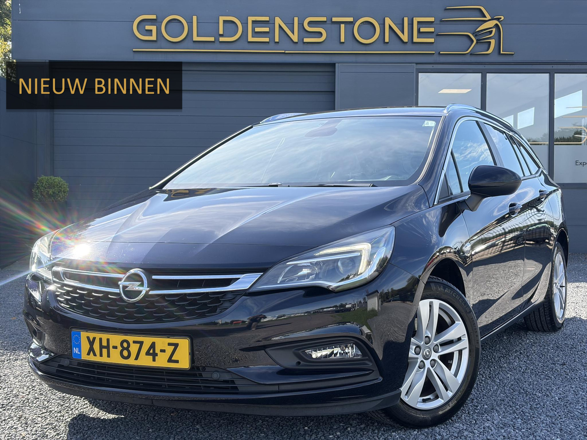 Opel Astra Sports Tourer 1.4 Turbo Online Edition ✓150pk✓2e Eigenaar✓Camera✓Carplay✓Navi✓Pdc V+A✓Stoelverw✓Stuurverw✓Clima✓Cruise✓Lm velgen✓6 Bak✓Comfortstoelen✓Dealer Onderhouden✓N.A.P✓Bj 12-2018✓Apk tot 01-2027
