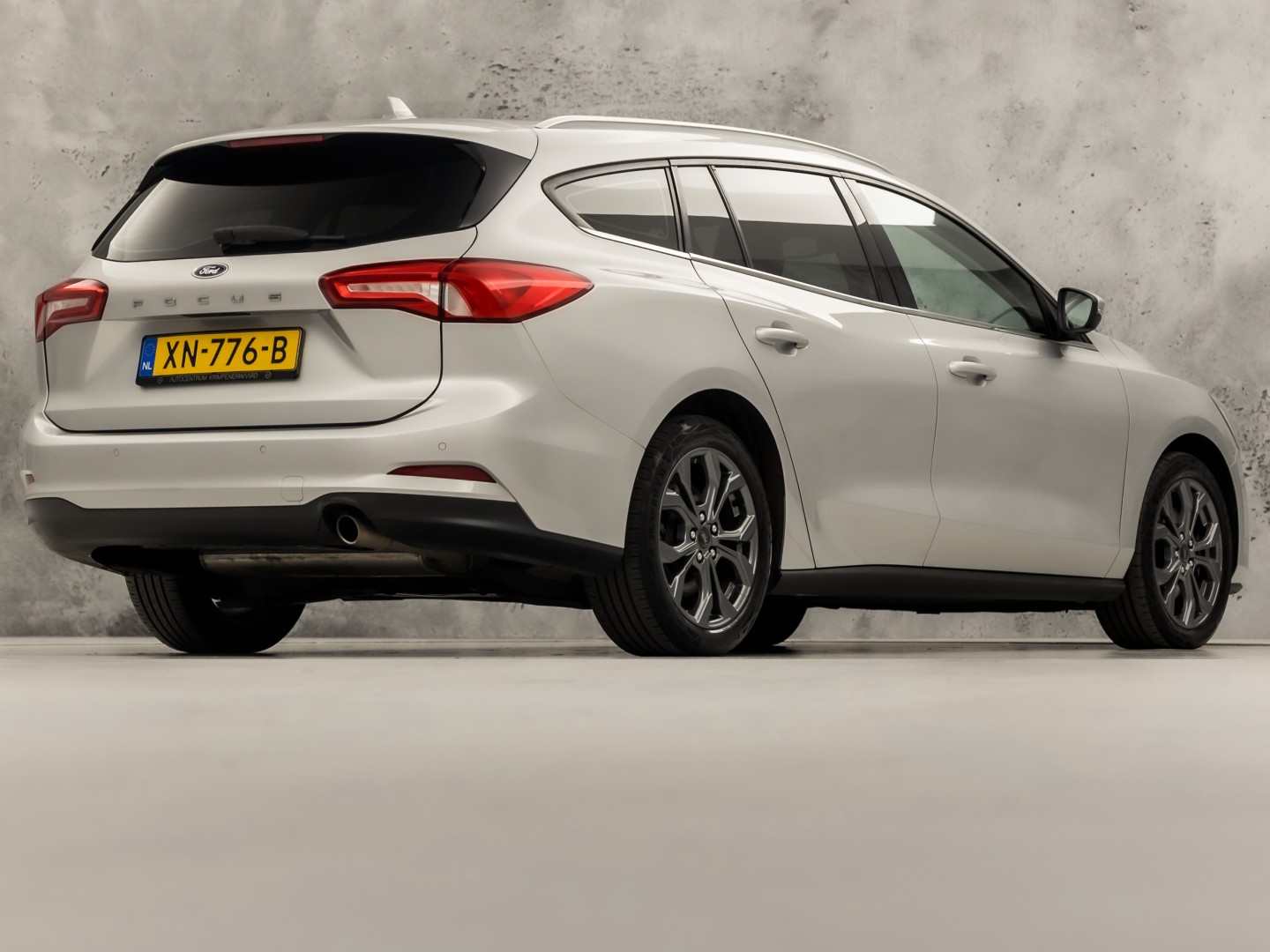 Ford Focus Wagon 1.0 EcoBoost Titanium Sport (APPLE CARPLAY, GROOT NAVI, STUUR/STOELVERWARMING, KEYLESS, SPORTSTOELEN, GETINT GLAS, LM VELGEN, CRUISE, NIEUWSTAAT)