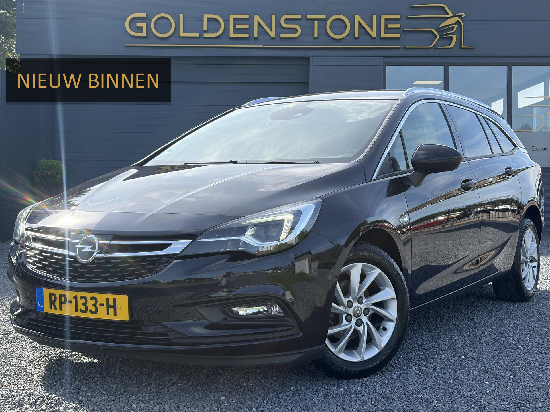 Opel Astra Sports Tourer 1.4 Business Executive ✓2 Eigenaar✓Camera✓Navi✓Trekhaakt✓Carplay✓Stoelverw✓Stuurverw✓Automaat✓Dealer Onderhouden✓Keyless✓Clima✓Cruise✓Pdc V+A✓Halfleder✓Comfortstoelen✓150pk✓Rijstrooksensor✓Dodehoeksensor✓Elekt Stoelen✓Lm velgen✓N.