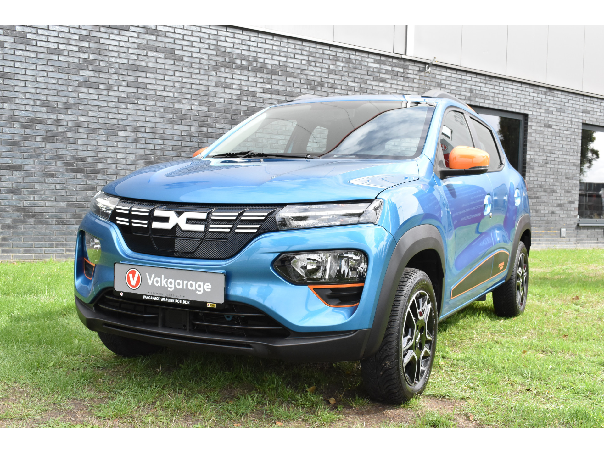 Dacia Spring Essential 27 kWh vol electric navigatie pdc Leer