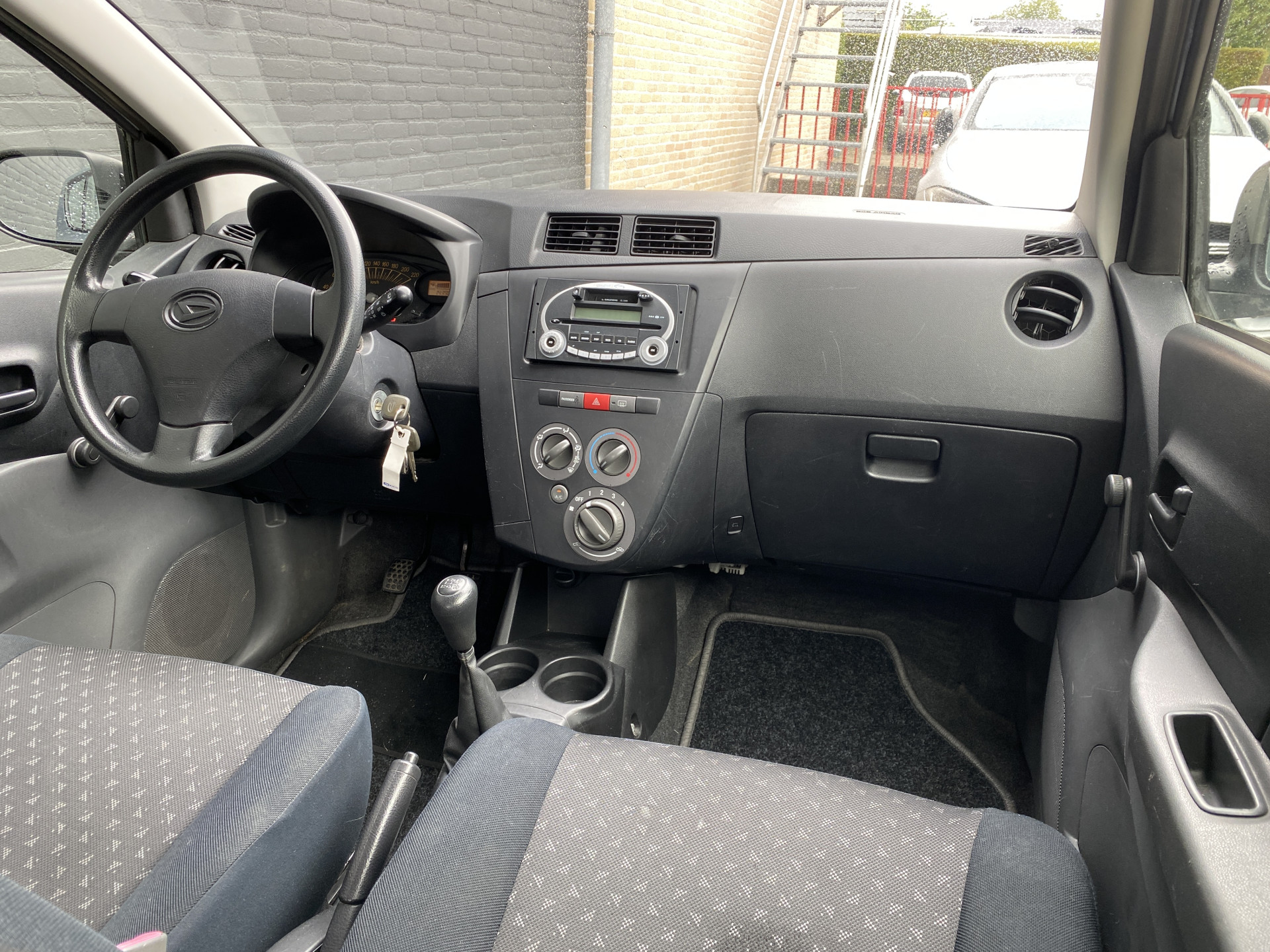 Daihatsu Cuore 1.0 Trend | airco | stuurbekrachtiging | airbags | radio cd speler | lichtmetalen velgen