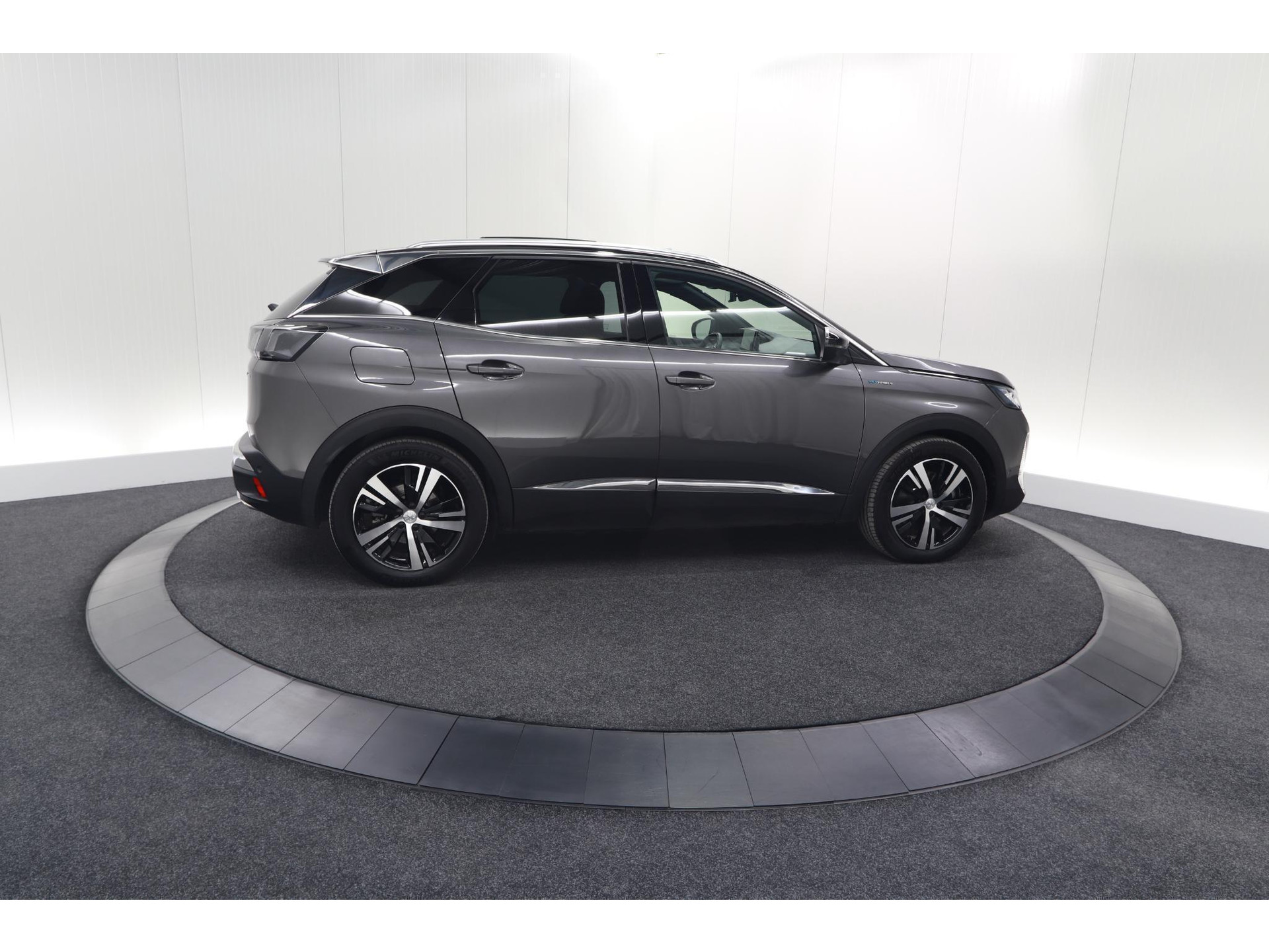 Peugeot 3008 HYbrid4 300 GT | Elektrisch Panoramadak | Dodehoekdetectie | Camera | Navigatie