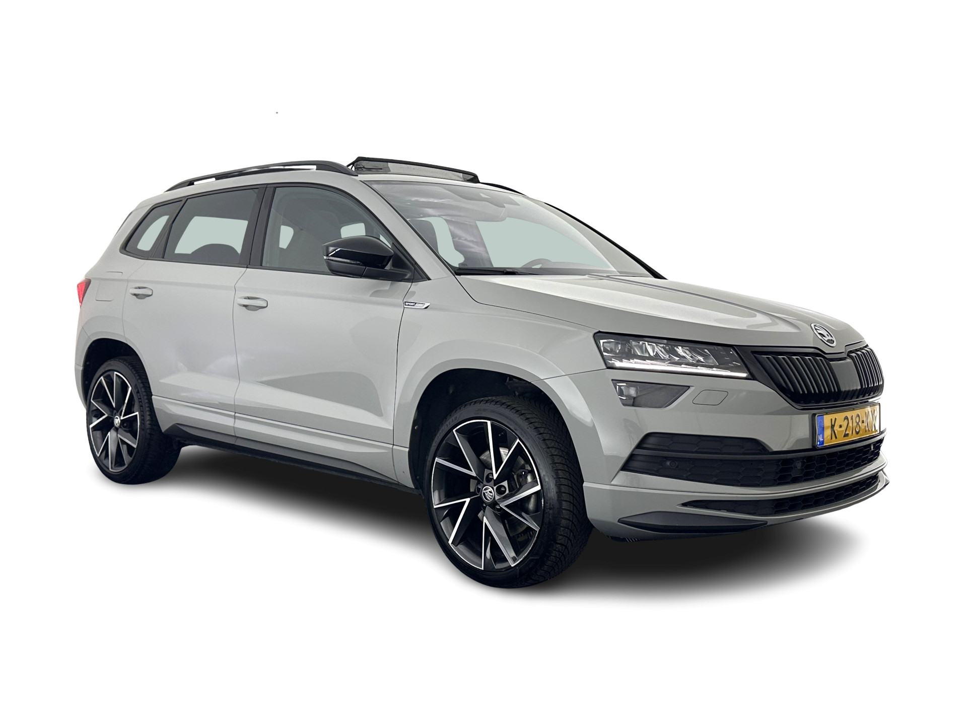 ŠKODA Karoq 1.5 TSI ACT Sportline Business (INCL-BTW) Aut. *PANO | DIGI-COCKPIT | FULL-LED | ADAPTIVE-CRUISE | CANTON-AUDIO | BLINDSPOT | HEATED-SPORTSEATS | CAMERA | AMBIENTLIGHT | NAVI-FULLMAP | KEYLESS | DAB+ | TOWBAR | PRIVACYGLAS