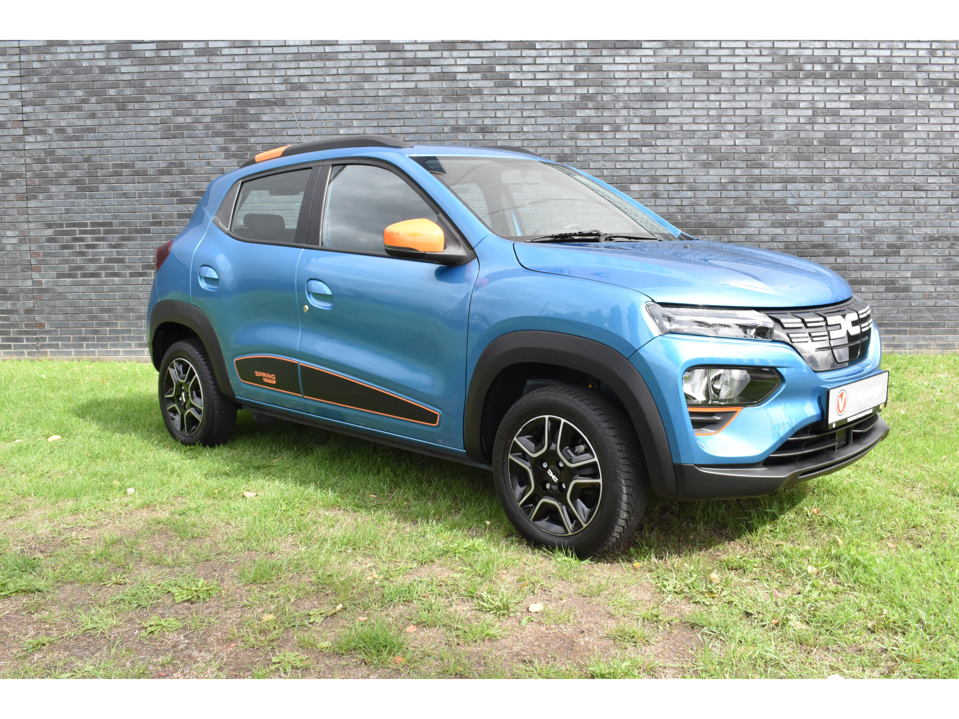 Dacia Spring Essential 27 kWh vol electric navigatie pdc Leer