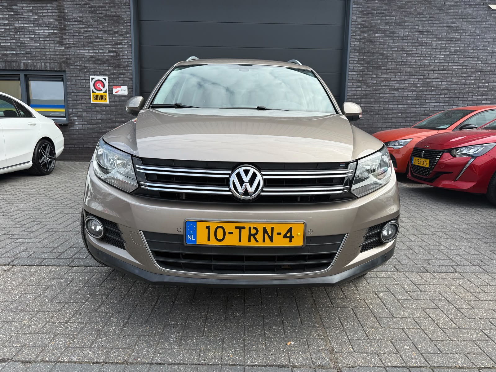 Volkswagen Tiguan 1.4 TSI Sport&Style | 1E EIGENAAR | 3/6/12MND GARANTIE | NAVI | PDC | 160 PK | LAGE KM |