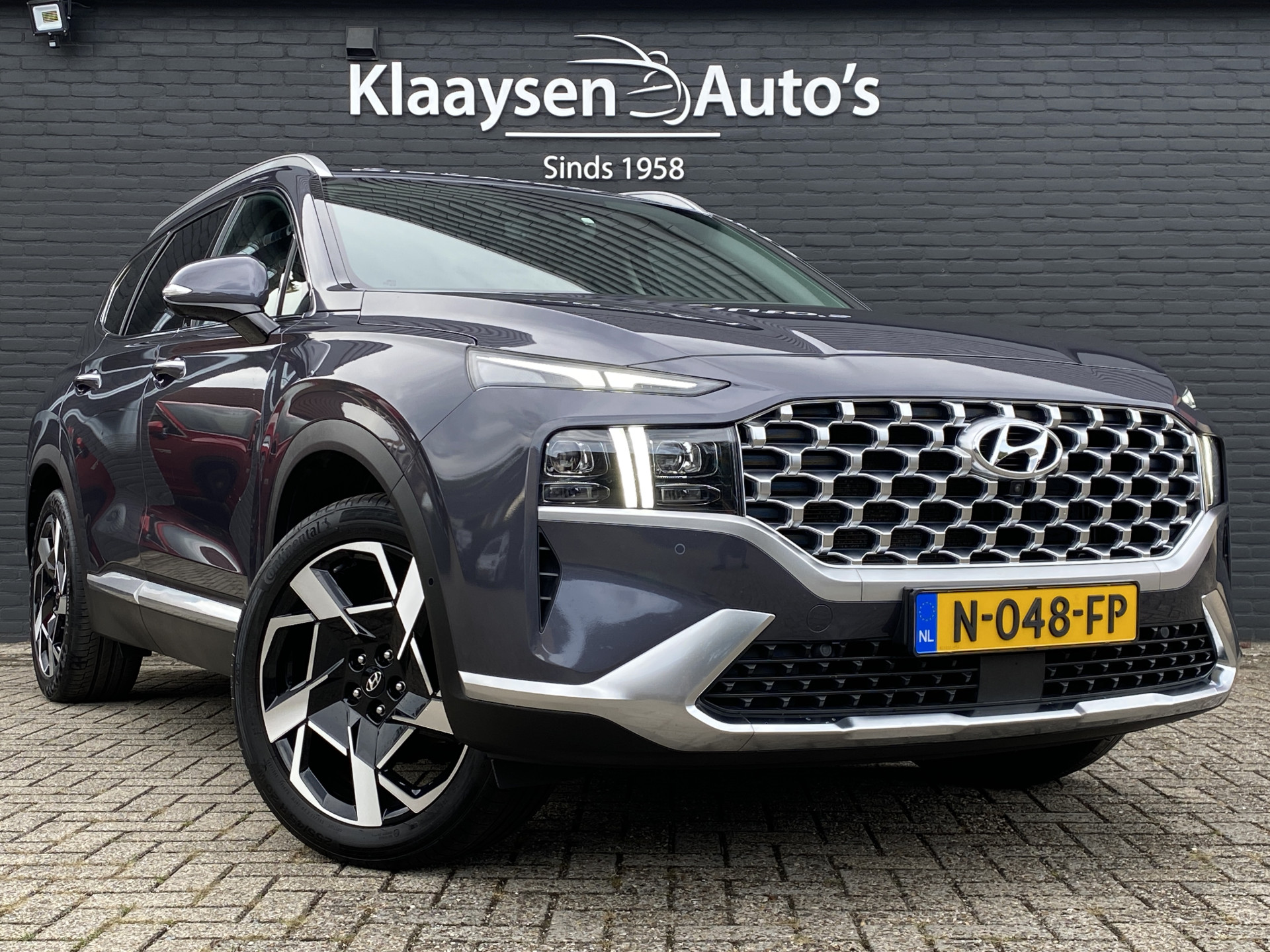 Hyundai Santa Fe 1.6 T-GDI HEV 230 pk Premium AUT. | dealer onderh. | leder inter. | 360 camera | trekhaak | memory | stoel-/stuurvw.