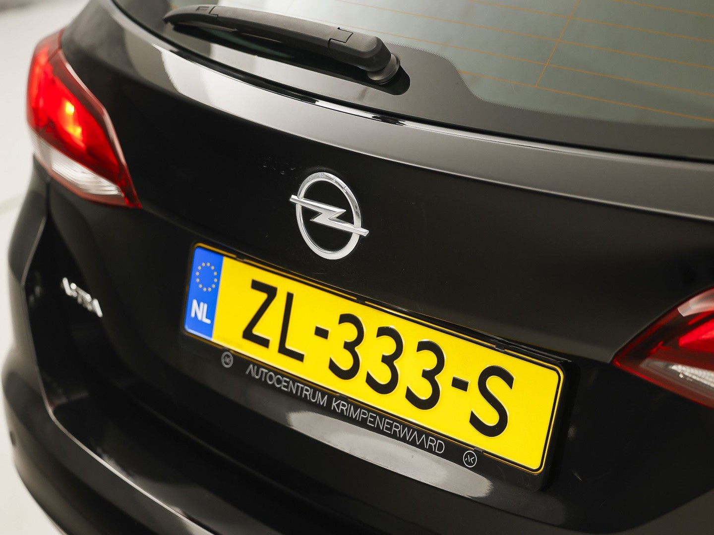 Opel Astra Sports Tourer 1.0 Turbo 120 Jaar Edition (APPLE CARPLAY, NAVIGATIE, LM VELGEN, PARKEERSENSOREN, SPORTSTOELEN, CRUISE, NIEUWE APK, NIEUWSTAAT)